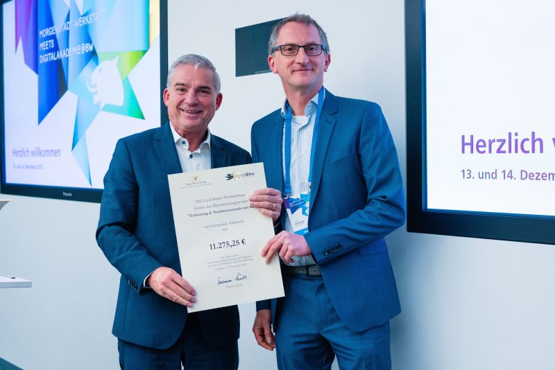 Überreichung des Förderbescheids Überreichung des Förderbescheids